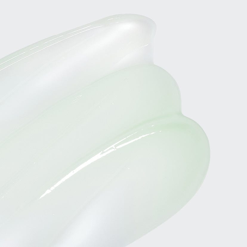 Product imageCelimax The Real Cica Soothing Cream lifestyle flat lay on white marble with centella asiatica leaves and white
