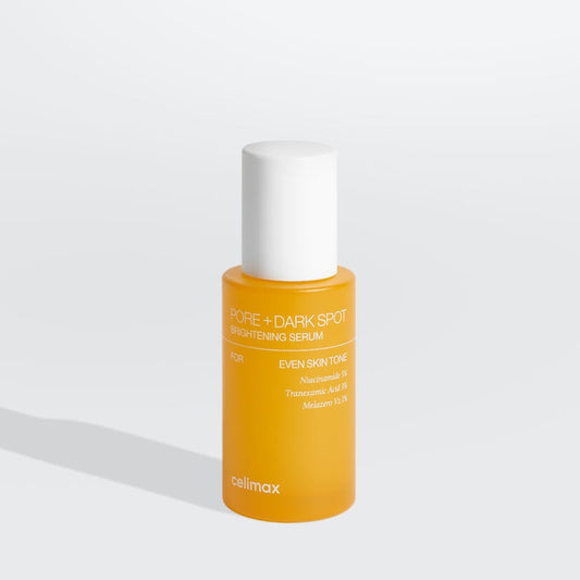 Product imageCelimax Pore+ Dark Spot Brightening Serum lifestyle flat lay on white marble with golden serum drops and dried botanicals