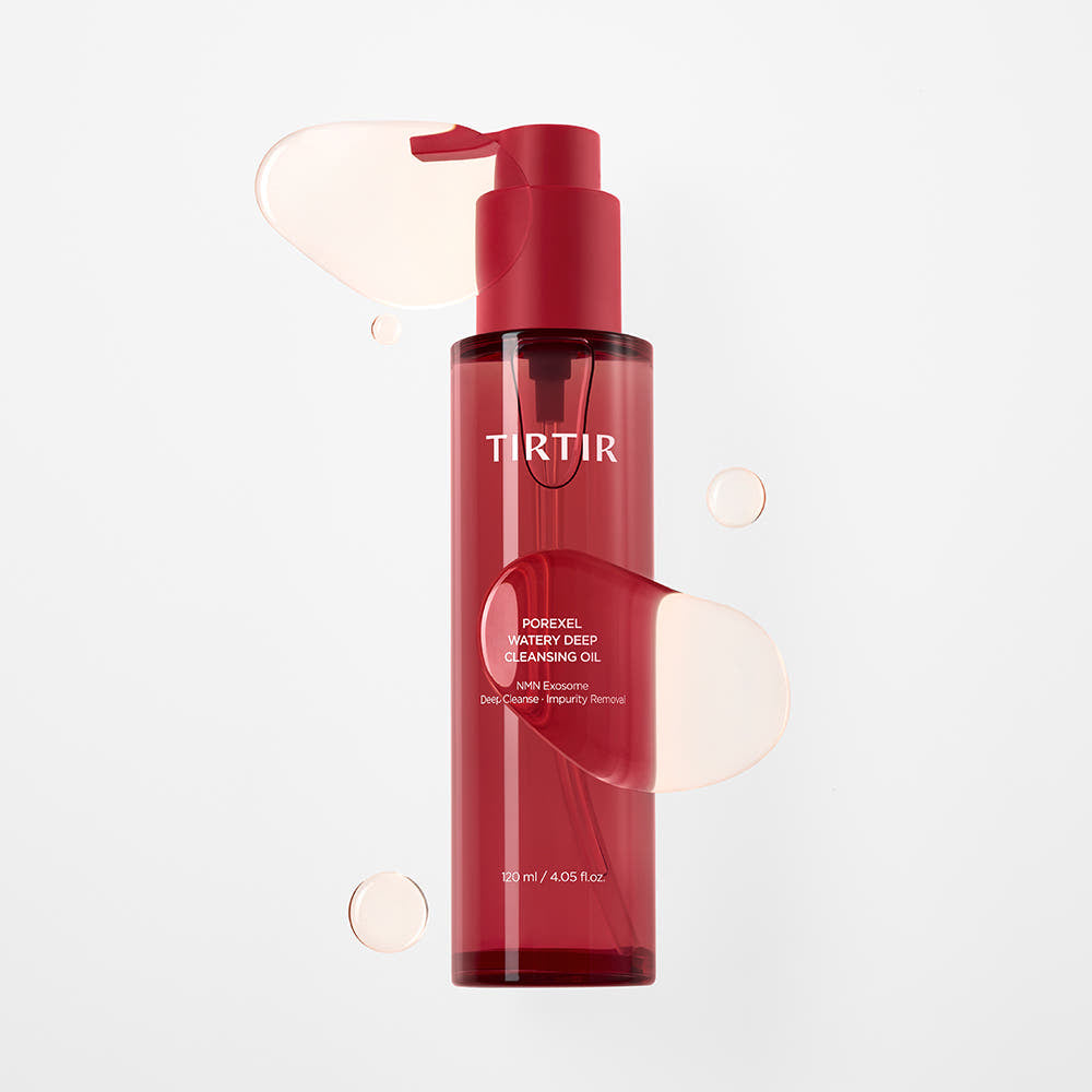 Product imageTIRTIR Porexel Watery Deep Cleansing Oil lifestyle flat lay on white marble with golden oil drops and dried white flowers